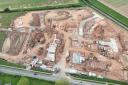 A drone image shows the latest work on the new housing development