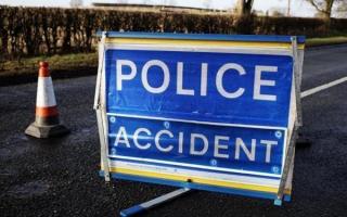 Police close road following collision