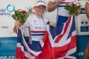 Lauren Rowles (left) and Laurence Whiteley savour victory at the FISA World Rowing Championships