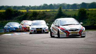 Matt Neal is in pole position in the British Touring Car championship after the second round at Thruxton.