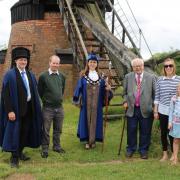 The Court Leet and The Rotary Club of Bromsgrove outside the historic windmill. Photo: Geoff Hawkesworth.