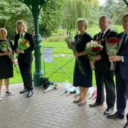 Bromsgrove district councillors laying flowers at the Bandstand in Sanders Park.