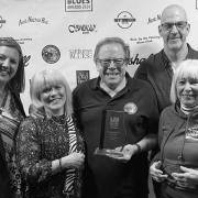The Upton Blues Festival racked up an award at the UK Blues Awards 2024 [L to R Shell Perris, Claire Bunn, Grahame Bunn, Steve Steinhaus and Ruth Etheridge]