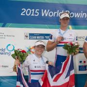 Lauren Rowles (left) and Laurence Whiteley savour victory at the FISA World Rowing Championships