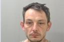Mark Spragg has been jailed for stabbing a retail worker with a needle. Photo: West Mercia Police