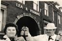 Andy Oakley and Rosa Dec with bottles of Lea & Perrins Worcestershire Sauce at the factory