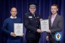 PC Alexander (left) and Adam Partridge (right) receive their award from Chief Constable Sir David Thompson. Photo: West Midlands Police.