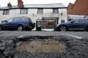 A pothole in Hereford. A councillor for a neighbouring local council has mocked Herefordshire's roads