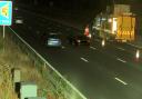 DANGEROUS: A black Audi was filmed driving in a closed lane on the motorway.
