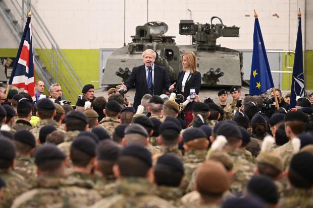 Prime Minister Boris Johnson with Prime Minister of Estonia Kaja Kallas meeting NATO troops after a joint press conference at the Tapa Army Base in Tallinn, Estonia. Picture date: Tuesday March 1, 2022. PA Photo. See PA story POLITICS Ukraine. Photo