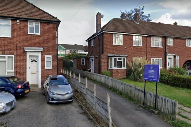 The hut is down this road behind homes (Pic: Google)