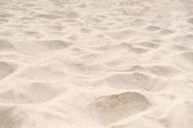 Bromsgrove Advertiser: It is very easy to bring sand back into your car at the end of a beach day (Canva)