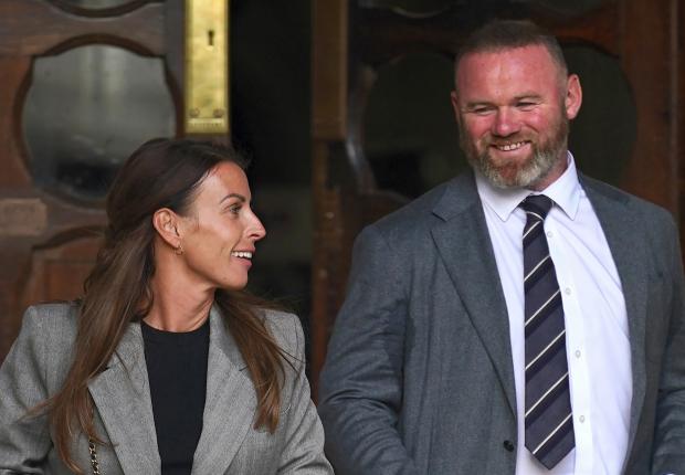 Bromsgrove Advertiser: Coleen and Wayne Rooney leaving the Royal Courts Of Justice, London in May (PA)