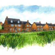 •	An artist’s impression of the new homes planned at the former Blue Bird factory in Hunnington
