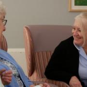 Lillian Bills, clinical support assistant at Primrose Hospice with patients in its day hospice.
