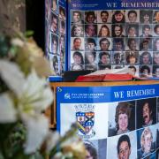 Portraits of some of the victims in the Remembrance Room in the grounds of Tundergarth Church where a service was held to mark the 35th anniversary of the Lockerbie bombing. Pic - Jane Barlow/PA Wire