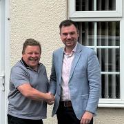 James Godsall, Managing Director of Jukes Insurance Brokers (right) welcoming Mike Clare from SO Insurance Services to the Jukes office.